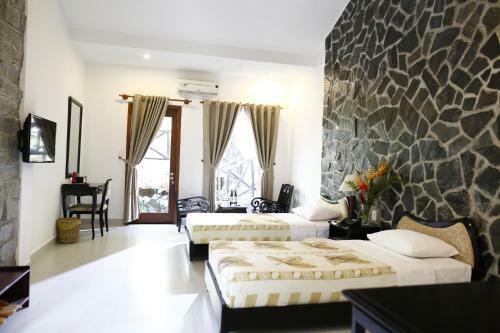 Hotel Madagui Forest City