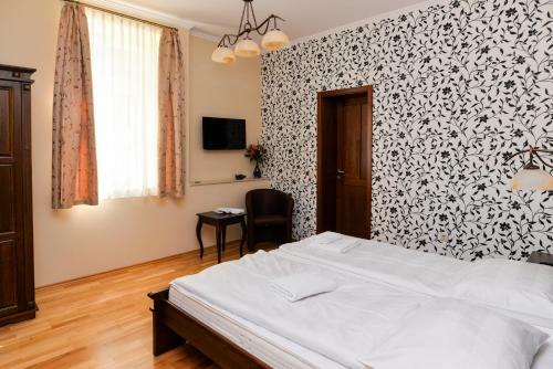 Hostal Althaus Vend�gh�z