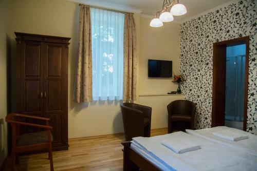 Hostal Althaus Vend�gh�z