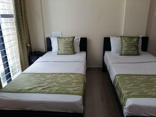 Hotel Suvarna Compact