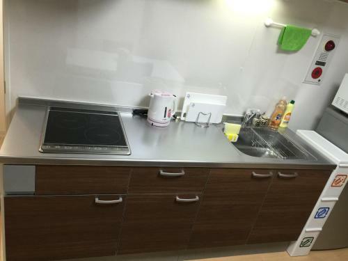 Apartamento Issyuku Hostel