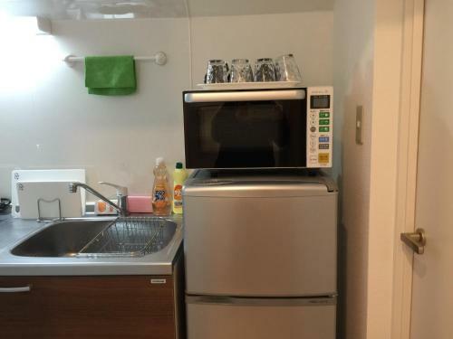 Apartamento Issyuku Hostel