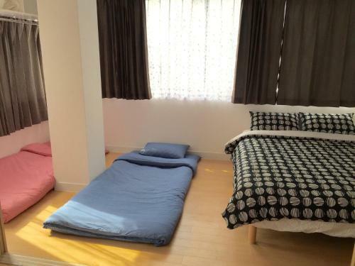 Apartamento Issyuku Hostel