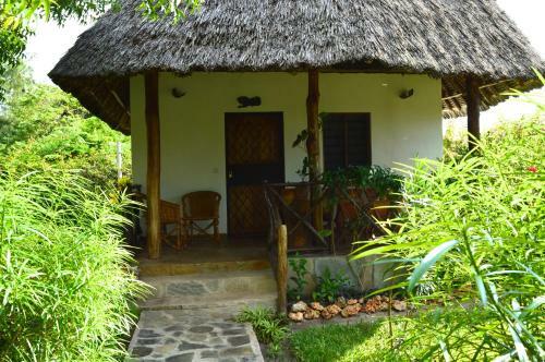 Coast Sun Gardens Cottage