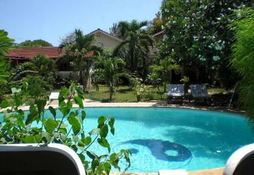 Apartamento Frangipani Cottages