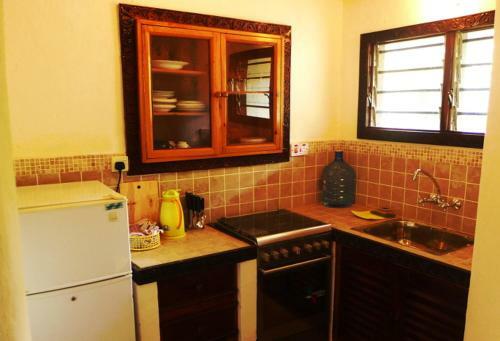 Apartamento Frangipani Cottages