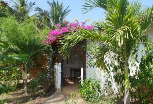 Apartamento Frangipani Cottages