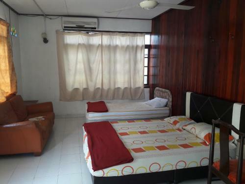 Hostal Rumah Rehat Qnm Holidays