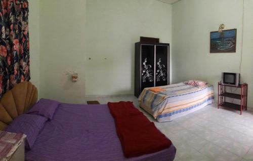 Hostal Rumah Rehat Qnm Holidays