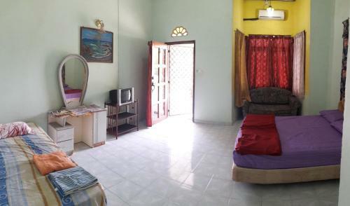 Hostal Rumah Rehat Qnm Holidays