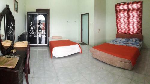 Hostal Rumah Rehat Qnm Holidays