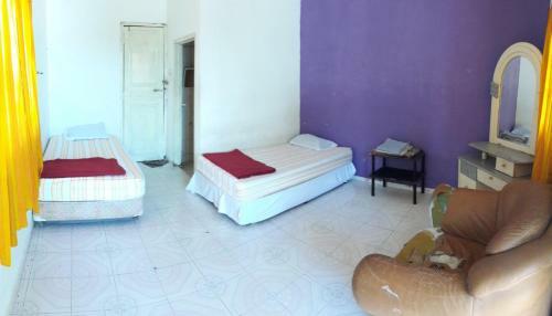 Hostal Rumah Rehat Qnm Holidays