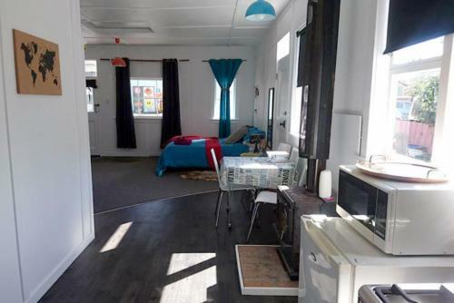 Apartamento Whanga Butcher Shop
