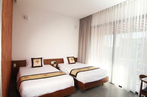 Hotel Kh�ch S?n Hu?nh Th?o