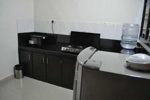 Apartamento Jyothi Suites