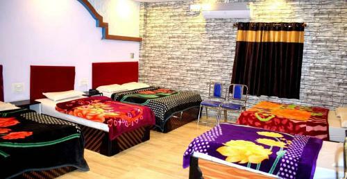 Hotel Rooms With 1 King Size Bedded + 2 Single Cart Beds + AC