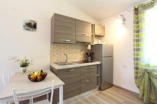 Apartamento Villaggio Olm�