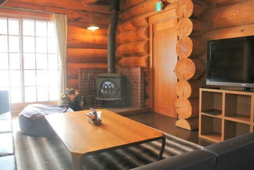 Apartamento White Tree Log House Madarao Tangram