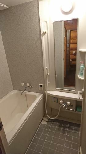 Apartamento White Tree Log House Madarao Tangram