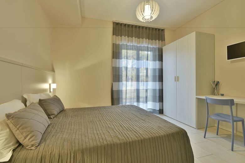 Hostal Tolomeo Rooms