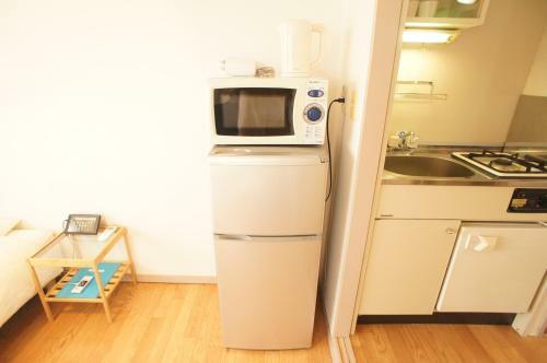 Apartamento Plusone Fujisaki