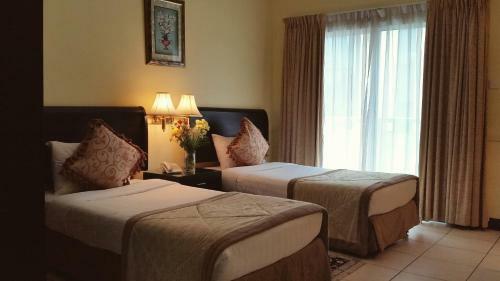 Apartamento Deebaj Al Khabisi Plaza