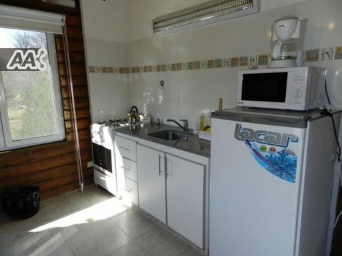 Lodge El Rodeo Apart Caba�as