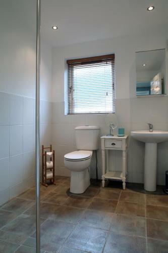 Apartamento Coach Road Cottages