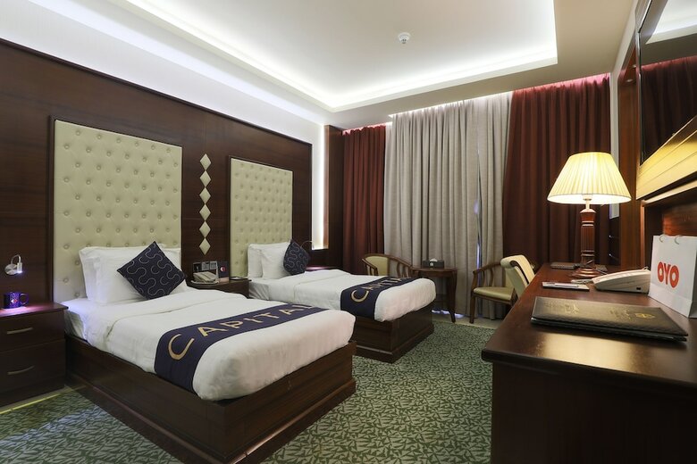 Capital O 325 Queen Palace Hotel
