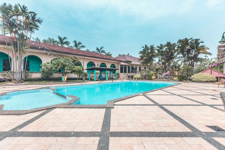 Capital O 1662 Ole Suites Hotel