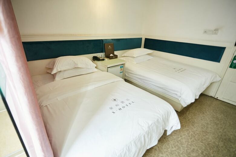 Xinghe Xinfeng Hotel - Railway Station