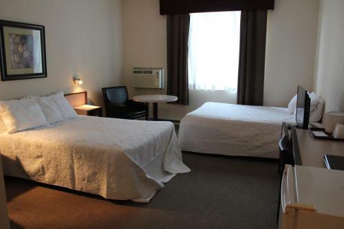 Le Capri Motel Et Suites