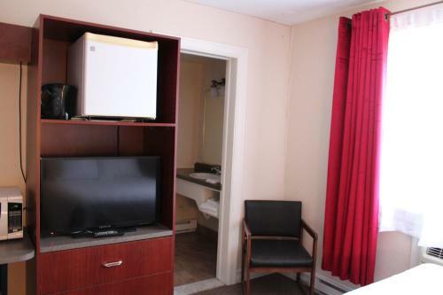 Le Capri Motel Et Suites