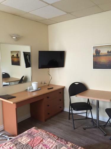 Le Capri Motel Et Suites