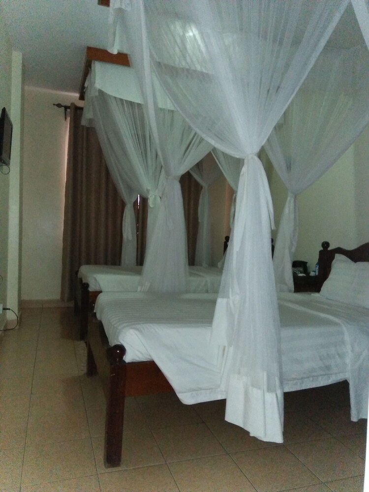 Tea Tot Paradise Hotel