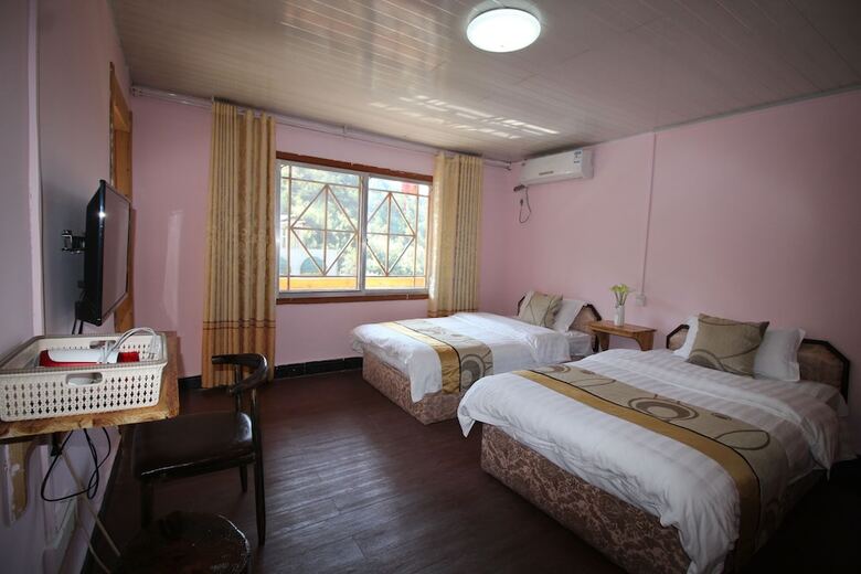 Hotel Zhangjiajie Red Apple Inn