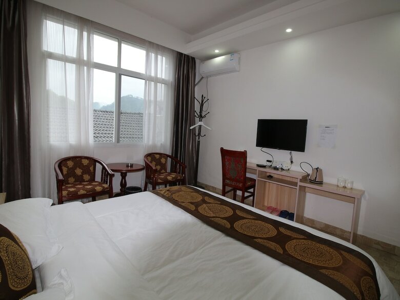 Hotel Zhangjiajie Red Apple Inn