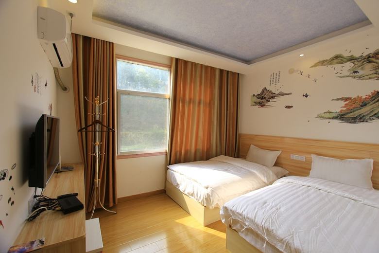 Hotel Zhangjiajie Red Apple Inn