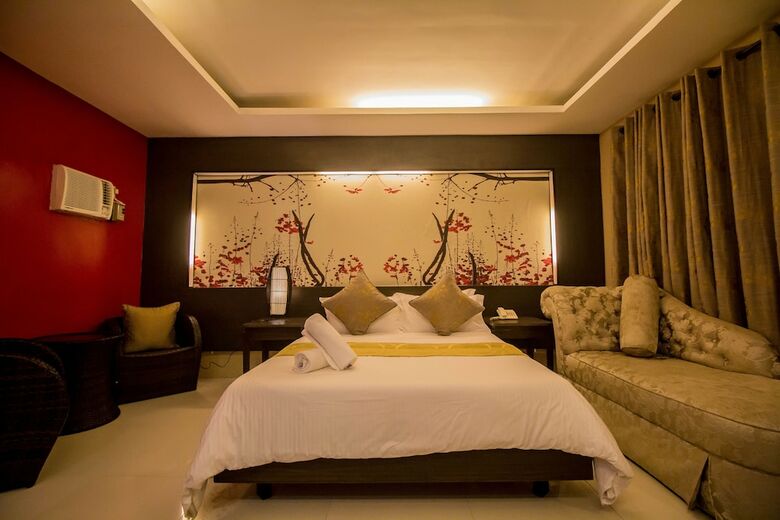 Hotel The Red Palm Suites And Restaurant