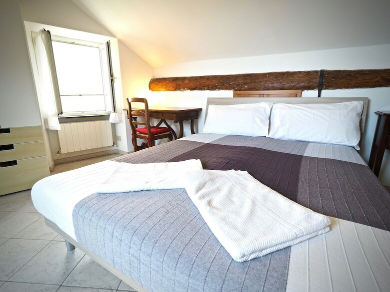 Apartamento Romantica Mansarda Pisano