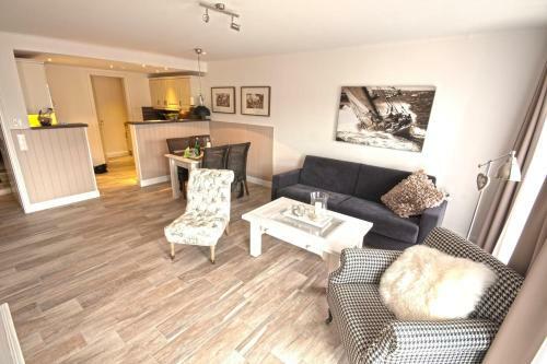 Apartamento Ferienwohnung "b�sumer Reethus"