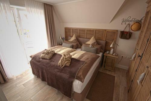 Apartamento Ferienwohnung "b�sumer Reethus"