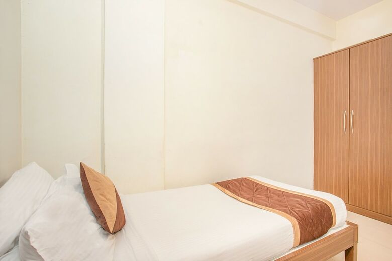 Oyo 7669 The Trinitywood Hotel