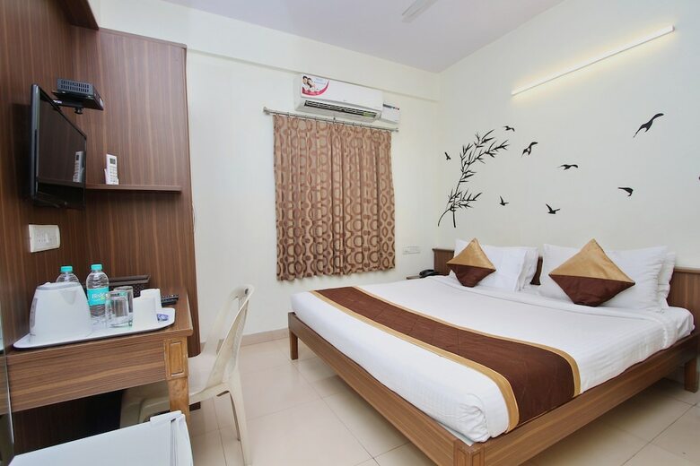 Oyo 7669 The Trinitywood Hotel