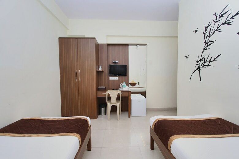 Oyo 7669 The Trinitywood Hotel