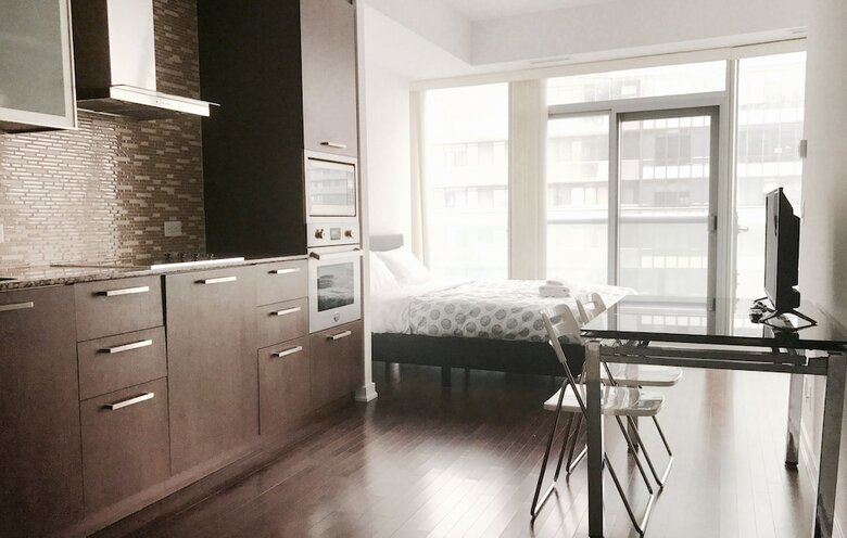 Modern Skyscraper Studio By Cn Tower