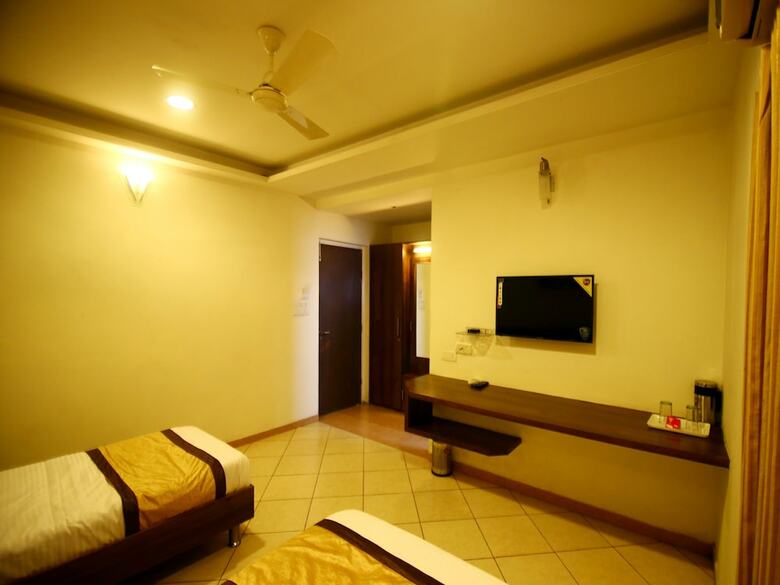 Oyo 10943 Hotel Plus Corporate
