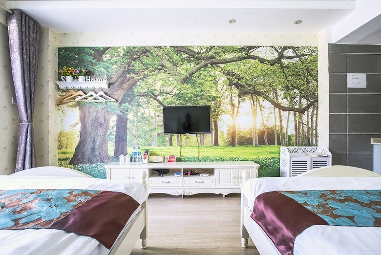 Jinghong Gaozhuang Anni Holiday Hotel