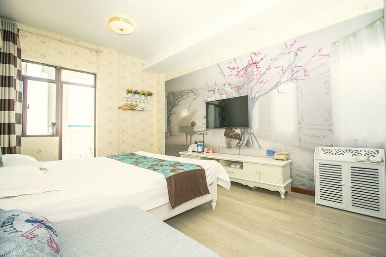 Jinghong Gaozhuang Anni Holiday Hotel