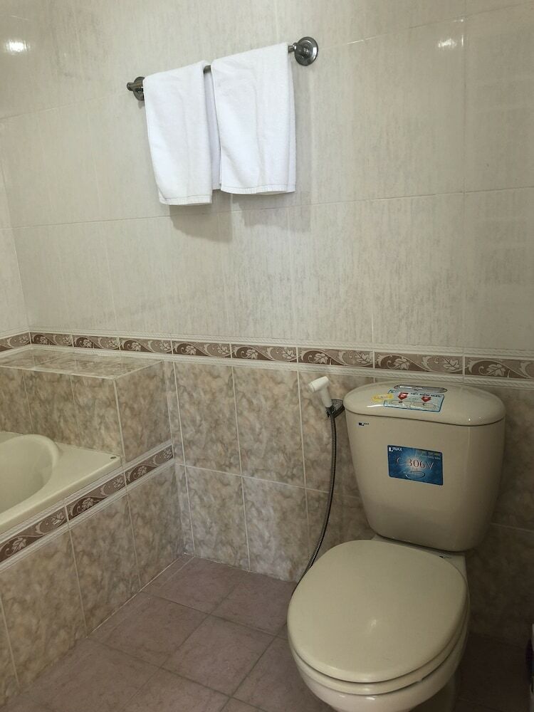 Hotel Three Palms Homestay